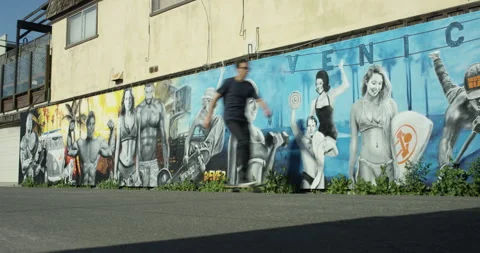 Skating in Front of Graffiti Wall Stock Footage 262030145