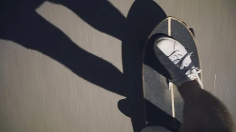 Skating longboard on beach promenade 動画素材 80303445