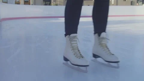 Skating on outside Ice Rink Stock Footage 294716313