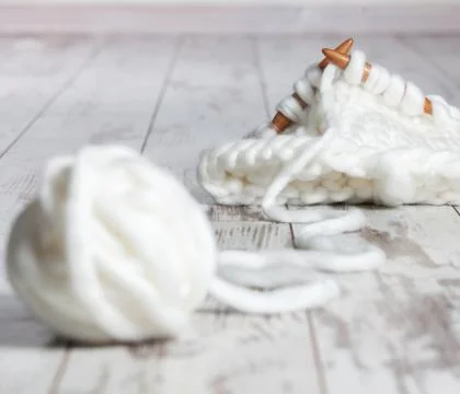 Skein with needle Stock Photos
