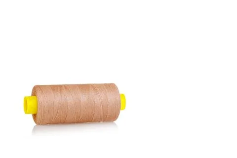 Skein of thread brown colors macro on a white background Foto stock
