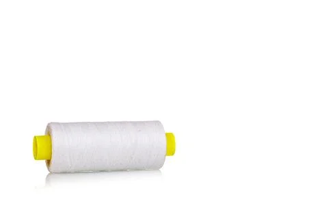 A skein of thread white colors macro on a white background Foto stock