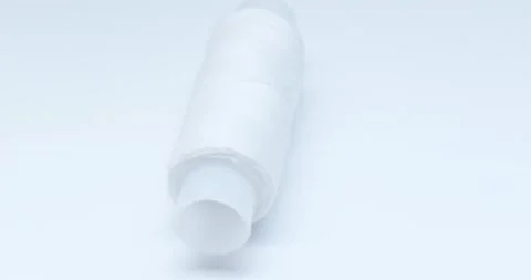A skein of white thread on a white background Stock Footage 166654006