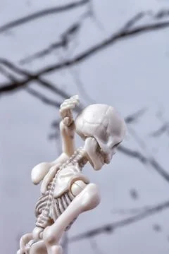 Skeleton figurine touch back head. Headache migraine, neck pain, Cervical 스톡 사진