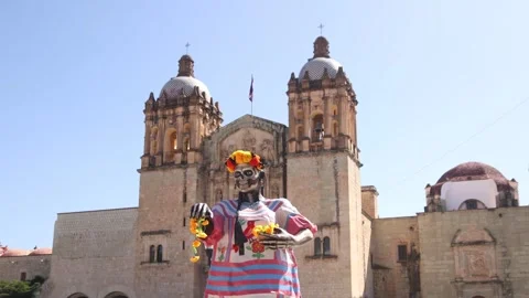 Skeleton float parade with Church and Convent of Santo Domingo de Guzmán in Stock Footage 295835791