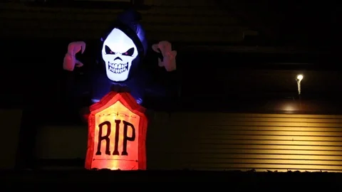 Skeleton grave with RIP dark background Halloween Stock Footage 111986070