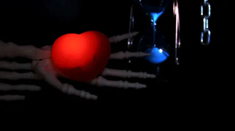 Skeleton holding a beating heart Stock Footage 39654878