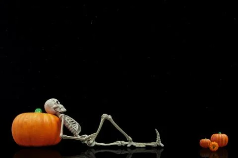 Skeleton Lying Under The Stars Stock Photos