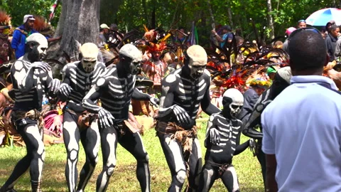 Skeleton men performing at the Paiya Show PNG Stock Footage 138185593