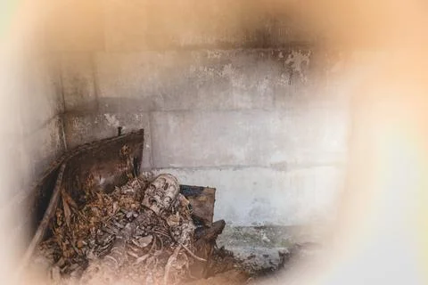 Skeleton remains inside an old crypt in Dublin cemetery Stock Photos