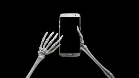 Skeleton Using Cell Phone 写真素材