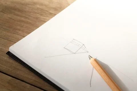 Sketch on book Stock Photos