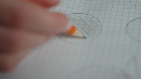 Sketch of hand within circle with grid background. Rapid hand drawing on graph Stock Footage 345517738