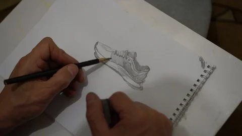 Sketch of a sneakers Stock Footage 98397304