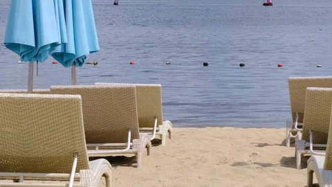 Sketch summer beach with closed beach umbrellas Stock Footage 112892508