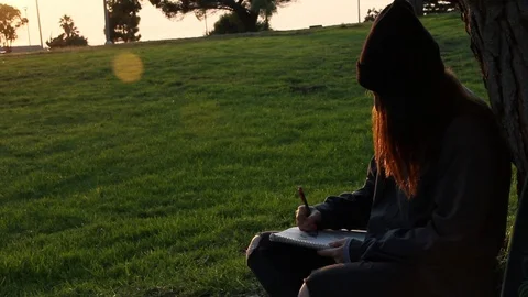 Sketching with the sun set Stock Footage 101874243