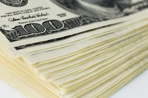 A skewed stack of old us dollar banknotes - close shot Stock Photos