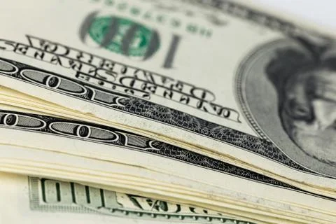 A skewed stack of old us dollar banknotes - close shot Stock Photos