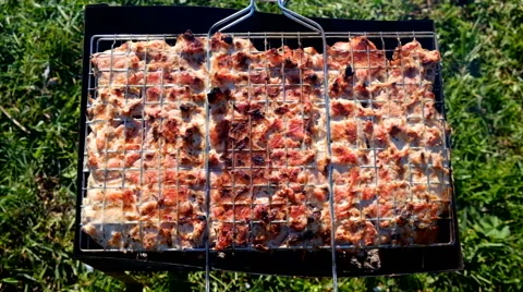 Skewer meat frying Stock Footage 63432536