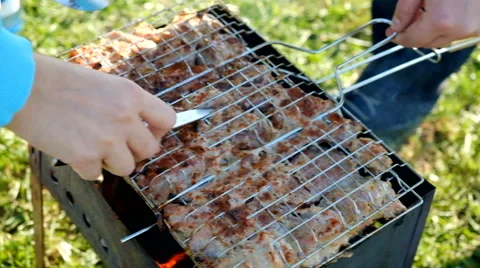 Skewer meat frying Stock Footage 63432650