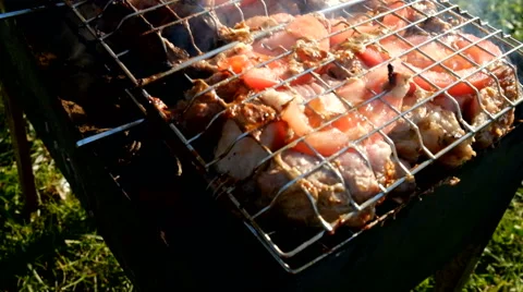 Skewer meat frying Stock Footage 63433243