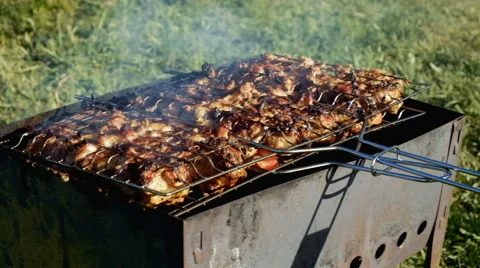 Skewer meat frying Stock Footage 63433308