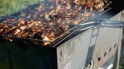 Skewer meat frying Stock Footage 63433436