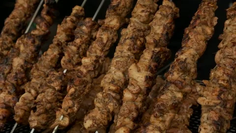 Skewered meat being grilled. Stock Footage 195178080