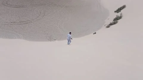 Skewing in desert Stock Footage 228822997