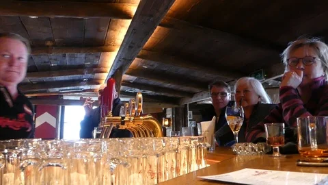 AT THE SKI BAR Stock Footage 121859204