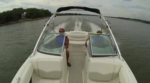 Ski Boat on lake looking back Stock-Footage 42351432
