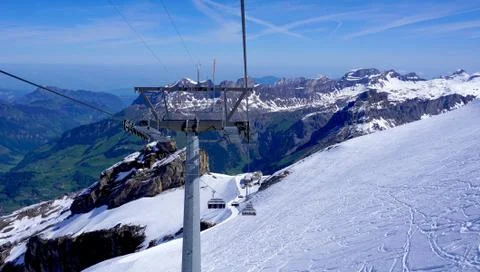 Ski cable car structure at snow mountains Titlis Stock Photos