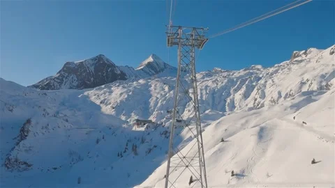 Ski Cable Car Tower in Snowy Alps of Kaprun Glacier in Beautiful Sunny Winter Stock Footage 309459024