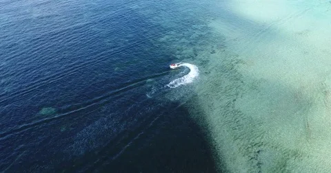 Ski Do Jet ski watercraft by drone from above taking off Vídeo Stock 81687381