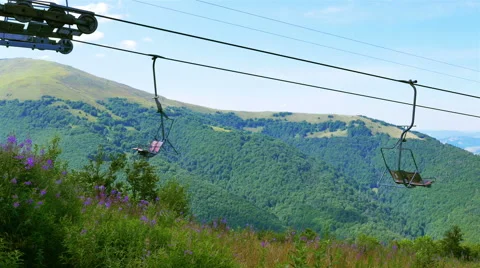 Ski elevator  rope  in summer day   up to mountain. 4K 3840x2160. Panorama Stockbeeldmateriaal 53467457