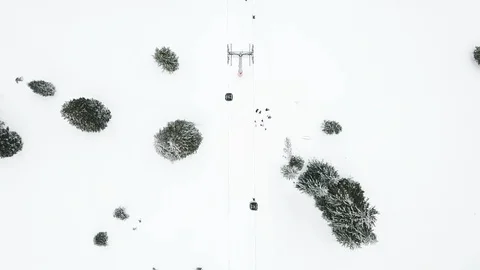 Ski elevator on snow mountain. Winter activity on ski resort. Stock Footage 103697694