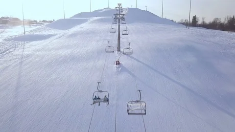 Ski elevator for transportation skiers and snowboarders on snow mountain in ski Stock Footage 88580710