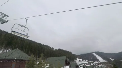 Ski elevator for transportation skiers and snowboarders on snow mountain Video stock 99079829