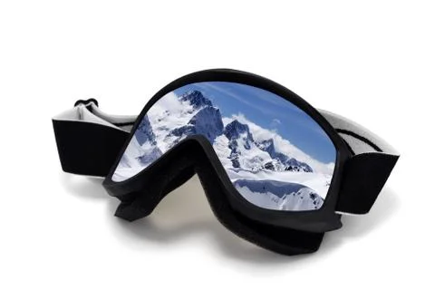 Ski goggles with reflection of winter mountains Stock Photos