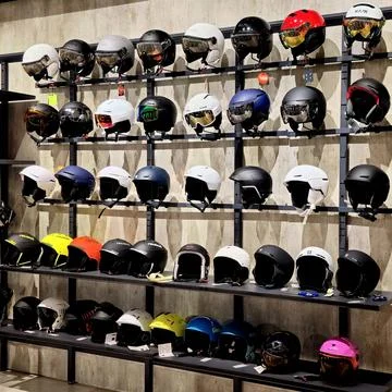Ski helmets on display, modern ski helmets showcase Stock Photos