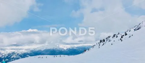 Ski Hill and sky Stock Photos