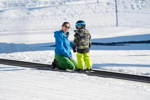 Ski Instructor with 3-Year Old Toddler Boy at a Mountain Resort Stock Photos