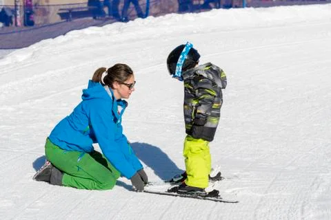 Ski Instructor with 3-Year Old Toddler Boy at a Mountain Resort Stock Photos