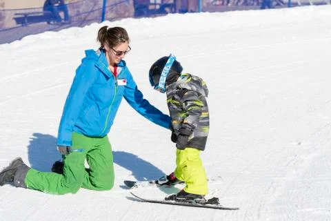 Ski Instructor with 3-Year Old Toddler Boy at a Mountain Resort Stock Photos