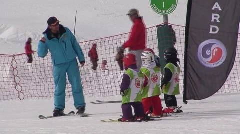 Ski Instructor with Children Stock Footage 1038128