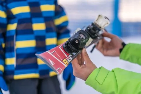 Ski instructor holding ski Stock Photos