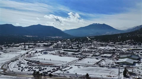 Ski Joring event Winter Estes Park Fairgrounds Rooftop Rodeo horses aerial 動画素材 331146820