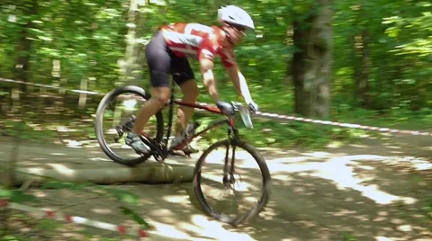 Ski jump on a bike Stock Footage 54990737