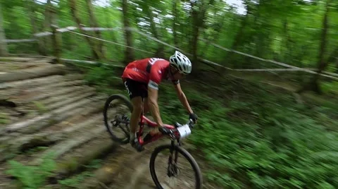 Ski jump on a bike Stock Footage 54990929