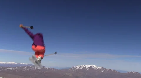 Ski jump with mountain and blue sky in background 스톡 동영상 33546481